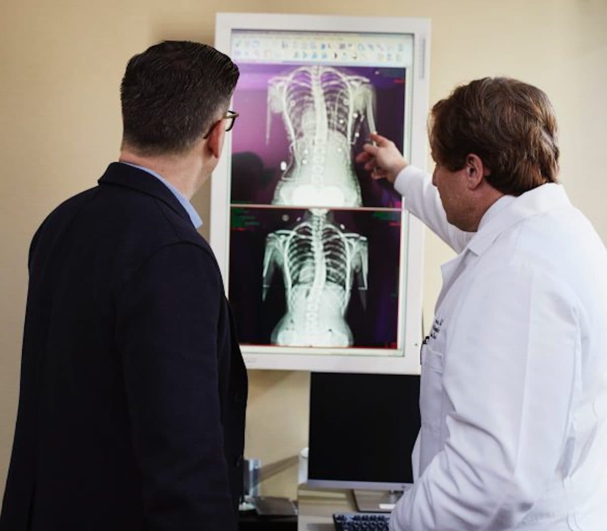 two doctors reviewing an x-ray